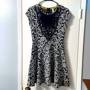 Black and white lace front mini dress